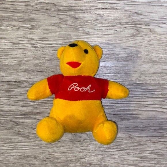 Vintage Disney Store Winnie the Pooh Musical Rattle Plush 5 Inch - Picture 1 of 3